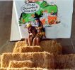 bikers on mountain of hay